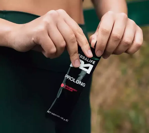 li-woman-holding-prolong-energy-gel.jpg-pdp-w875h783 - a2z nutrition